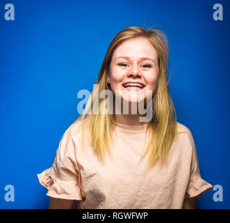 Blonde Woman posing in studio Stock Photo