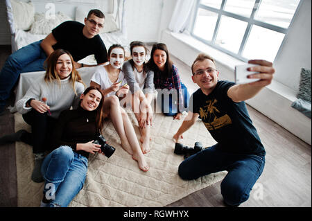 Group of people making selfie. Team photographer, designers and models stuff on photosession, master class of proffesionals. Stock Photo