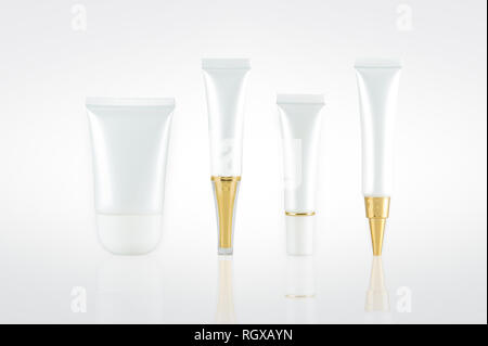 Set of cosmetic containers isolated on background Stock Photo