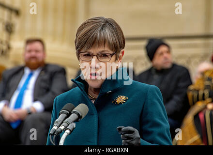 Topeka, Kansas, USA, January 14, 2019 Democrat Governor Laura Kelly delivers her inaugural speech is front of the steps of the Kansas State Capitol building Credit: Mark Reinstein/MediaPunch Stock Photo