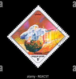 Postage stamp from Hungary depicting the Pal Varga science fiction painting Spaceship near Phobos. Stock Photo