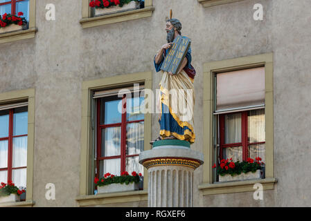 The Mosesbrunnen, Moses fountain in old town. The figure of Moses holding Ten Commandments in Bern, Switzerland. Stock Photo