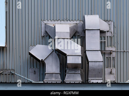 Exhaust air ventilation system. Air Handling Unit. Ventilation system of shopping mall. AHU. Exterior building pipe. Exhaust air system for clean and  Stock Photo