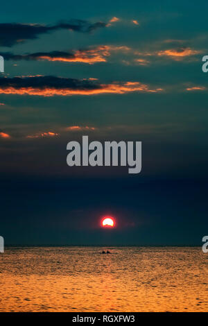 Sport. Rowing. A rowing session in a beautiful sunset light. Stock Photo