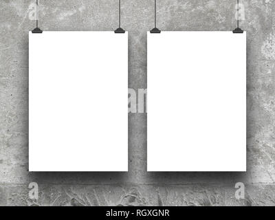 Two blank frames against gray concrete wall background Stock Photo
