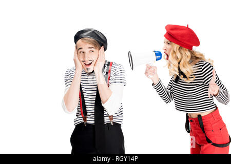 angry french woman screaming in megaphone near boyfriend isolated on white Stock Photo