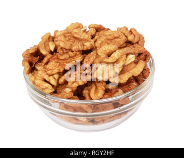 Walnuts in glass bowl isolated on white background Stock Photo