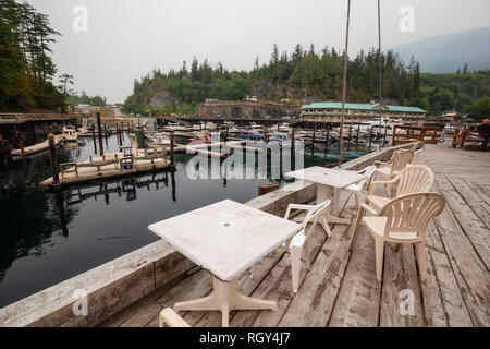 Telegraph Cove, Vancouver Island, BC, Canada - August 20, 2018: Beautiful view on the marina during a foggy day. Stock Photo