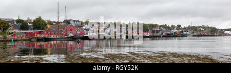Lunenburg, Nova Scotia, Canada - October 7, 2018: Beautiful view of a historic port on the Atlantic Ocean Coast during a cloudy day. Stock Photo