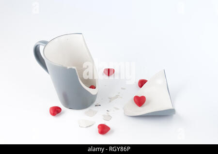 Broken dishes. Broken feelings and attitudes. Front view Stock Photo