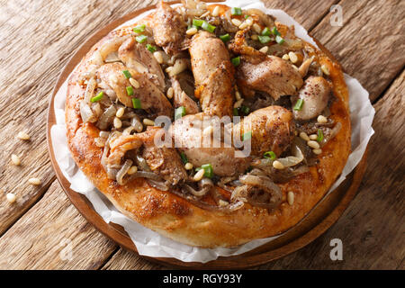 Palestinian musakhan or sumac chicken closeup on a plate on the table. horizontal Stock Photo