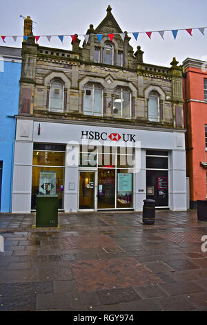 The HSBC UK Bank, local branch in Dunraven Place, Town Centre, Bridgend, S.Wales UK. ATM outside. Stock Photo