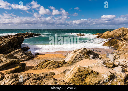 Waves and surf in a cove at Fistral Beach, Newquay, Cornwall, UK Stock Photo