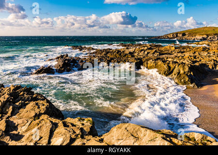 Crashing waves and surf in a cove at Fistral Beach, Newquay, Cornwall, UK Stock Photo