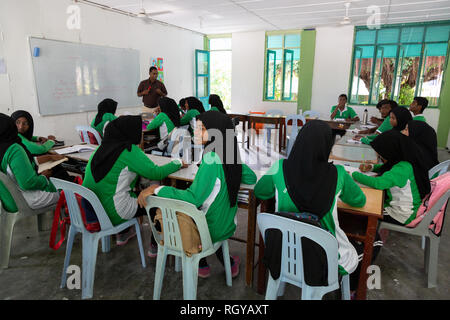 Asia school - muslim secondary schoolchildren in the classroom, Ukulhas Island, the Maldives, Asia Stock Photo