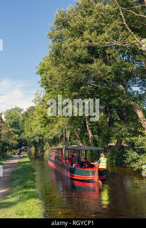 Llangollen, Denbighshire, Wales, United Kingdom.  Boats on the Llangollen canal.  These craft, known as narrowboats, were designed specifically for th Stock Photo