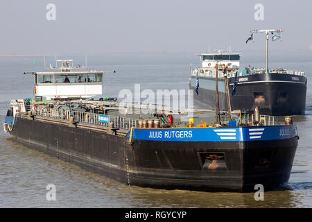 ANTWERP - MAR 12, 2016: Tanker barges on the Scheldt river near Antwerp Stock Photo