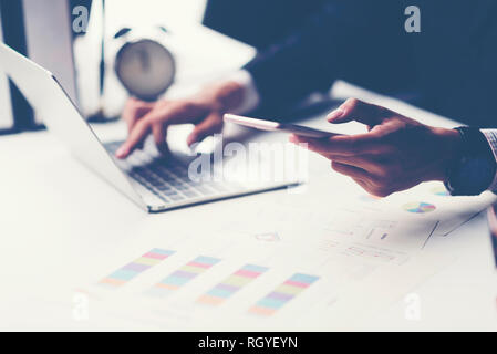 Cropped shot of a man's hands using a laptop at home, rear view of business man hands busy using laptop at office desk, young male student typing on c Stock Photo