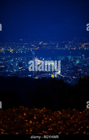 Penang Island & Mainland Penang overview from Penang Hill at Dawn with City lights Stock Photo