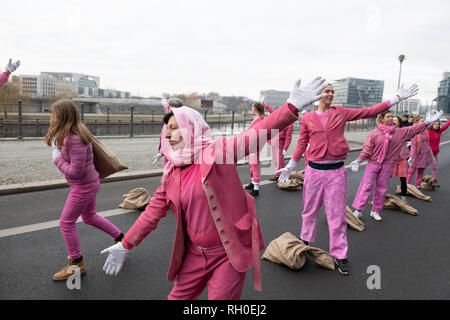 Berlin, Germany. 31st Jan, 2019. Demonstrators show a performance in an action of the environmental protection organization Greenpeace. The reason for the action is the presentation of the results of the coal commission to the Chancellor's Office this evening. The environmental activists demand an immediate withdrawal from coal mining. Credit: Annette Riedl/dpa/Alamy Live News Stock Photo