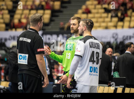 Goalkeeper Andreas WOLFF (GER) discusses with Oliver ROGGISCH l. (Team Coordinator, GER) and Jannik KOHLBACHER r. (GER) after the match, match for 3rd place, Germany (GER) - France (FRA) 25:26, on 27.01.2019 in Herning/Denmark Handball World Cup 2019, from 10.01. - 27.01.2019 in Germany/Denmark. | usage worldwide Stock Photo