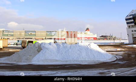 Helsinki, Finland - January 31, 2019: Large heap of snow for collection on the Port of Helsinki Olympiaterminaali ferry terminal. This area is where heavy goods vehicles line up to move onto the ferry. Credit: Taina Sohlman/ Alamy Live News Stock Photo