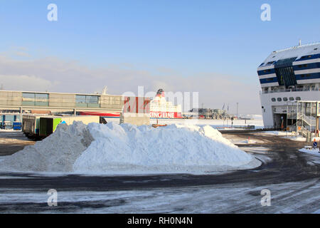 Helsinki, Finland - January 31, 2019: Large heap of snow for collection on the Port of Helsinki Olympiaterminaali ferry terminal. This area is where heavy goods vehicles line up to move onto the ferry. Credit: Taina Sohlman/ Alamy Live News Stock Photo