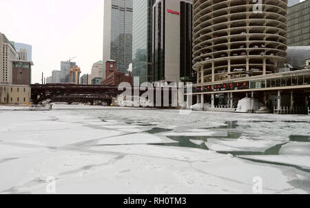 Chicago, USA. 31st Jan, 2019. The Chicago River is seen frozen in downtown Chicago, the United States, Jan. 31, 2019. Chicago, the biggest city in the U.S. Midwest, was struck by the polar vortex with the minimum temperature reaching minus 30 degrees Celsius in the city. Credit: Wang Ping/Xinhua/Alamy Live News Stock Photo