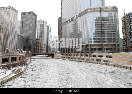 Chicago, USA. 31st Jan, 2019. The Trump Hotel is seen alongside the frozen Chicago River in Chicago, the United States, Jan. 31, 2019. Chicago, the biggest city in the U.S. Midwest, was struck by the polar vortex with the minimum temperature reaching minus 30 degrees Celsius in the city. Credit: Wang Ping/Xinhua/Alamy Live News Stock Photo