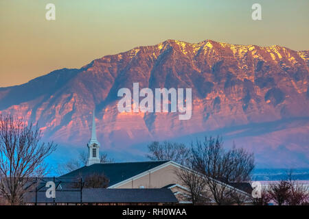 Church steeple against Mount Timpanogos in Utah Stock Photo