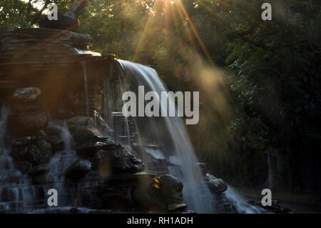 Chinese dragons, statues of ronin and fountains at sunset Russia Stock Photo