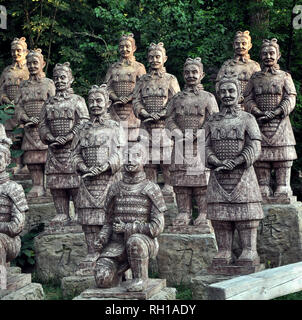 Chinese dragons, statues of ronin and fountains at sunset Russia Stock Photo