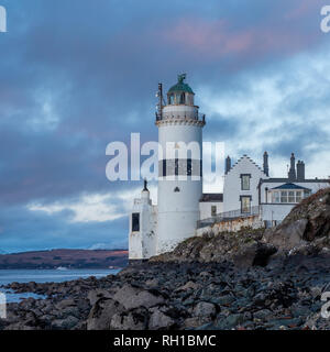 The Cloch lighthouse is on the shore of the Firth of Clyde, Scotland. It is situated low down on the E shore of the Firth of Clyde a short distance SW Stock Photo