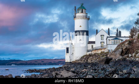 The Cloch lighthouse is on the shore of the Firth of Clyde, Scotland. It is situated low down on the E shore of the Firth of Clyde a short distance SW Stock Photo