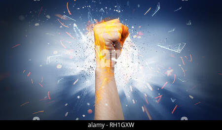 Hand hits strongly and makes fire beam around  Stock Photo