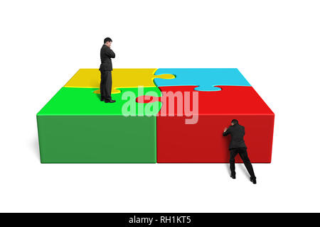 Finish assembling puzzles isolated in white background Stock Photo