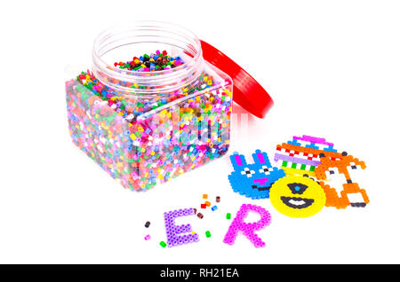 Mix color plastic particles children's mosaic. Studio Photo Stock Photo