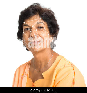 Biometric verification. Human facial detection, high technology. Indian woman face ID scanning. Stock Photo