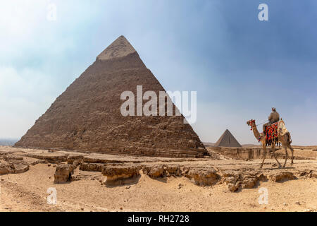 Panorama of the area with the great pyramids of Giza with Pyramid of Khafre (or Chephren) and the Pyramid of Menkaure in the far view, Egypt Stock Photo