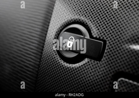 interior door lock button on car dashboard Stock Photo