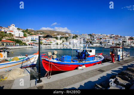 Batsi, Island of Andros, Cyclades, Greece - Colourful fishing boats in the harbour of Batsi, the holiday resort of the Greek island of Andros.  Batsi, Stock Photo