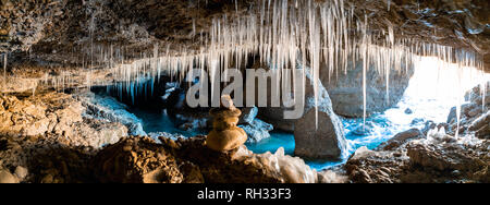 Panorama of the Cave with ice stalactites. Stock Photo