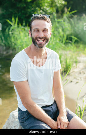 Smiling young man Stock Photo
