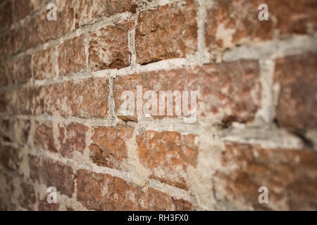 brick wall background texture close-up with blurred details building concept Stock Photo