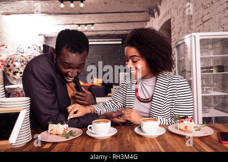 Joyful happy couple having a great time together Stock Photo