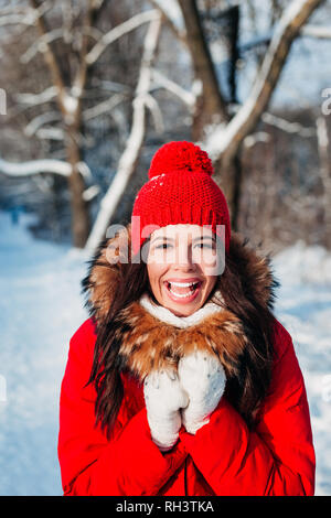 Portrait of young beautiful woman on winter outdoor background Stock Photo