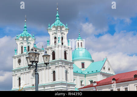 Azure and red roofs of the city, Cathedral of St. Francis Xavier in Grodno, Belarus Stock Photo