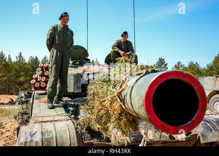 NATO soldiers on tank Abrams. International Military Training 'Saber Strike 2017', Adazi, Latvia, from 3 to 15 June 2017. US Army Europe-led annual In Stock Photo