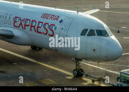 An Iberia Express Airbus A320, registered as EC-JFH, at manchester Airport in England. Stock Photo