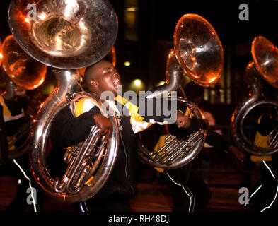 Members of the Williamson High School Mighty Marching Lions band perform during the Order of Inca Mardi Gras parade in Mobile, Alabama. Stock Photo